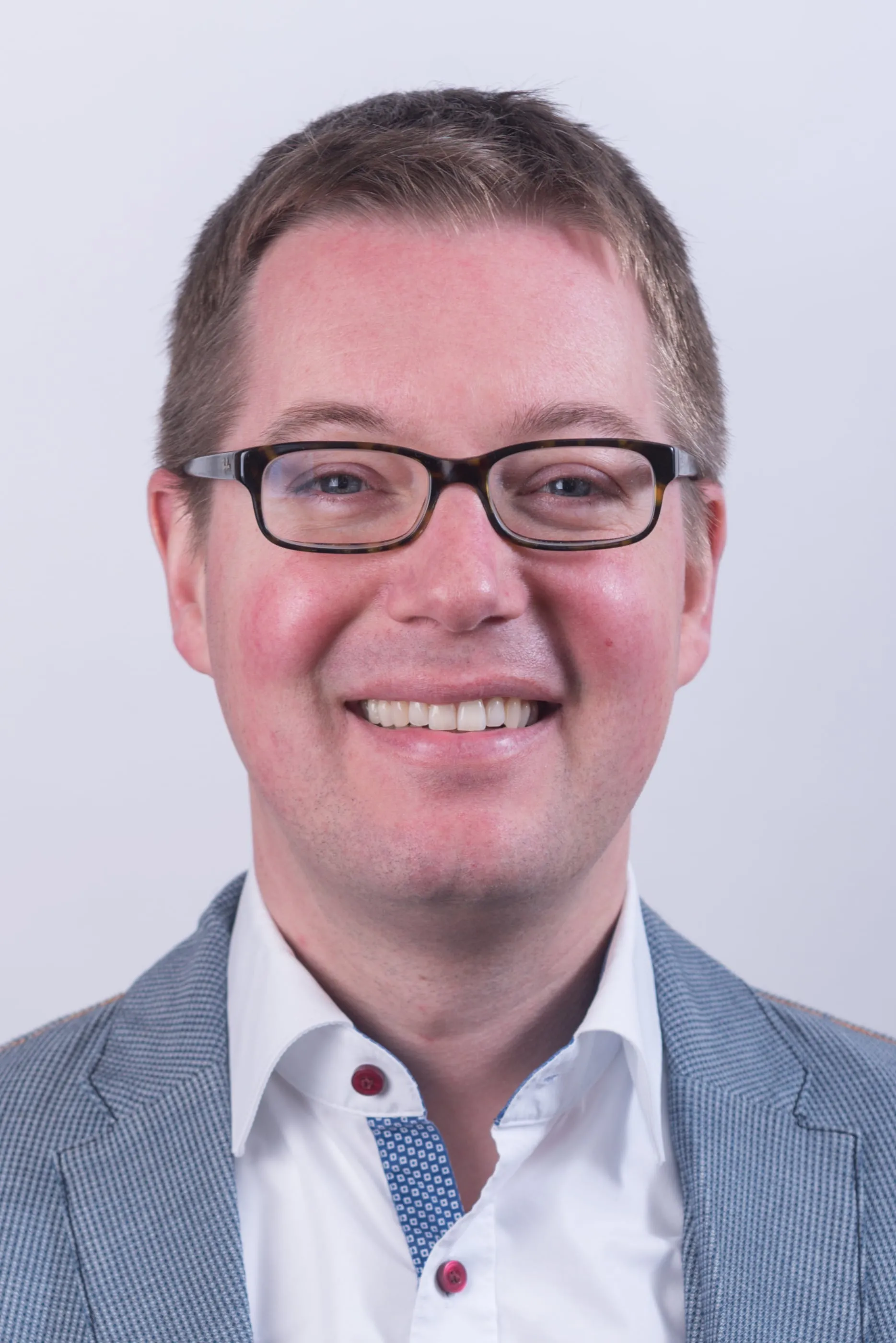 Corporate headshot photographed on location for AstraZeneca