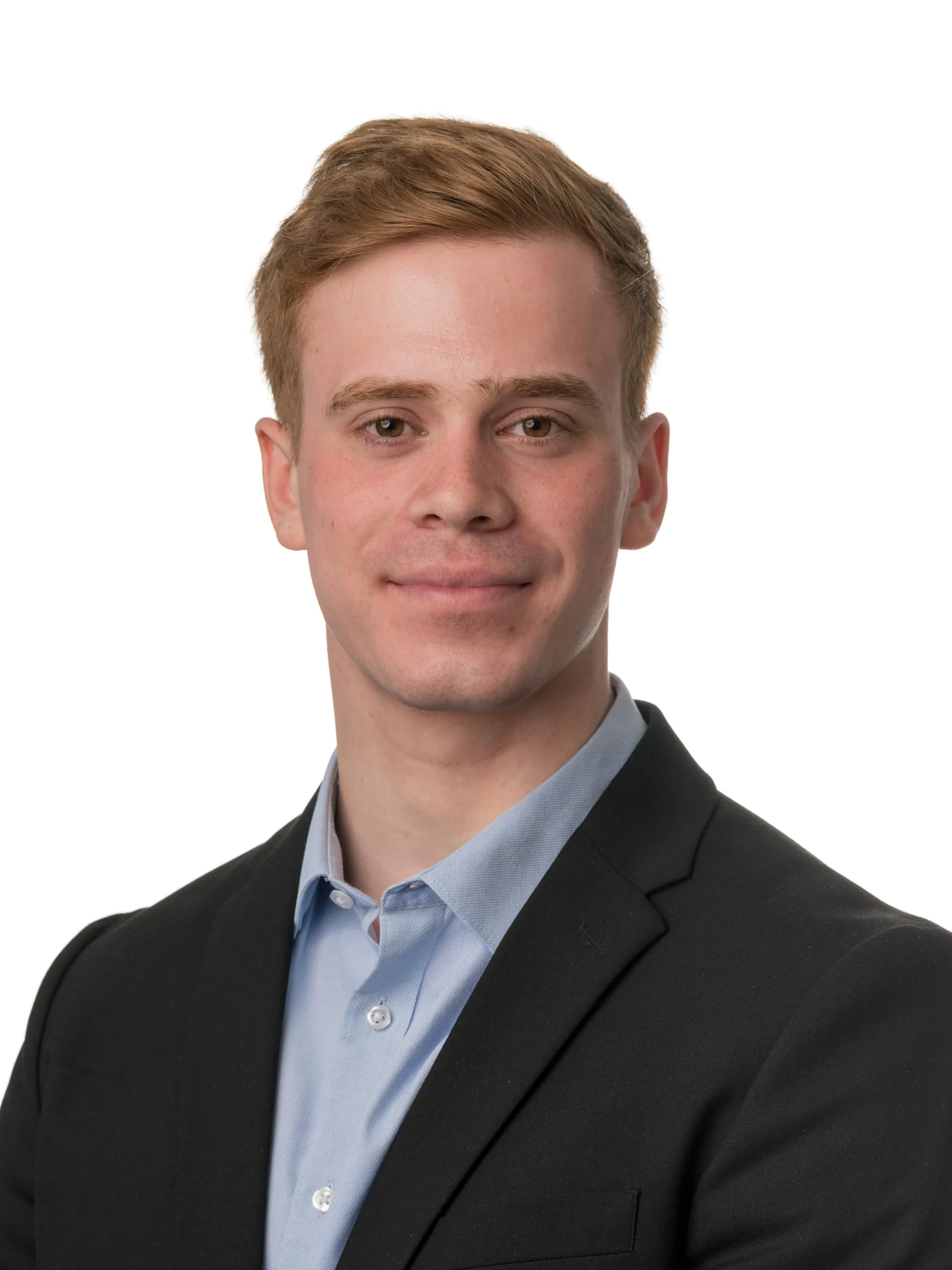 Corporate headshot of a man in a dark jacket on a white background